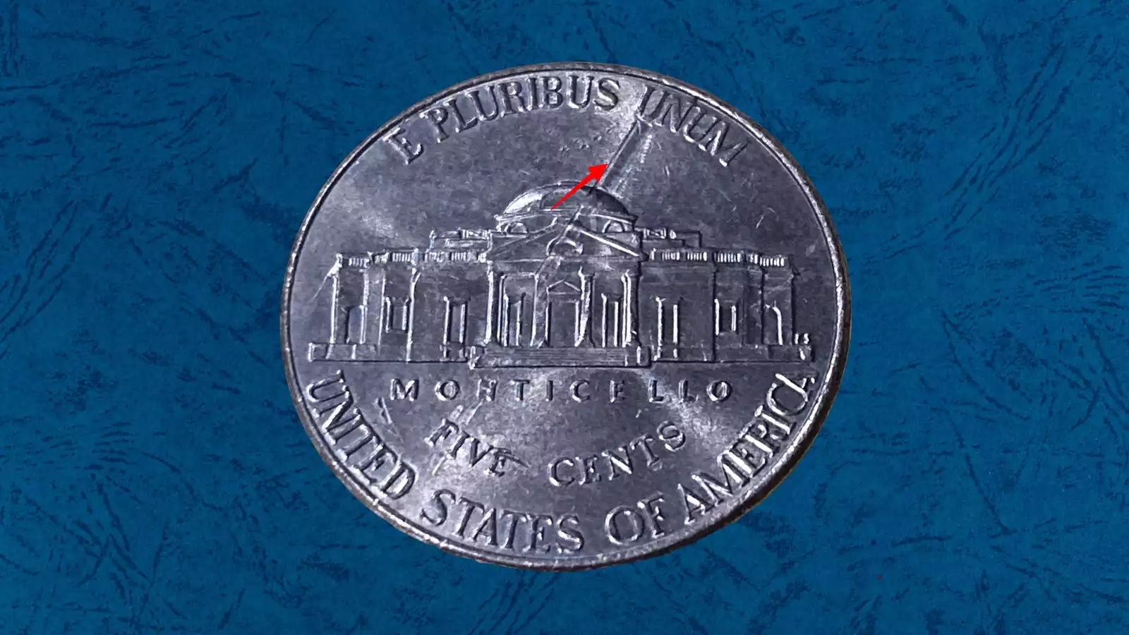 2016 Jefferson nickel obverse lamination error showing surface peeling near Jefferson's portrait